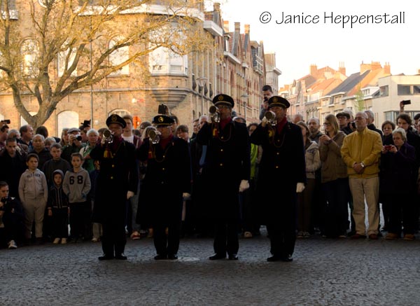 Four buglers sounding The Last Post at the Last Post Ceremony at the Menin Gate, Ypres.